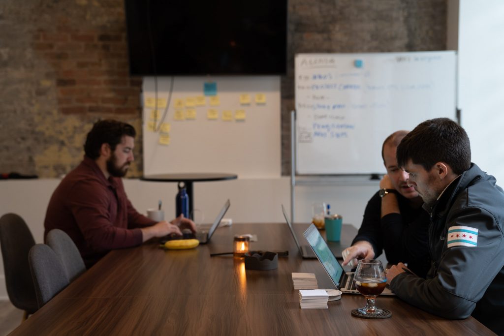 Team members collaborating in a conference room.