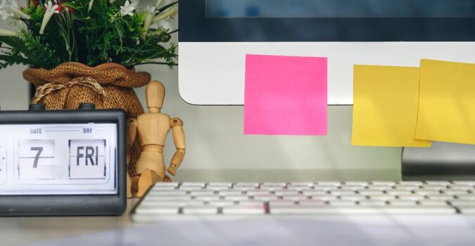 Sticky notes on computer monitor